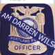 Illustration for article titled Cop Who Hugged Crying Kid in Viral Photo Allegedly Supported Darren Wilson